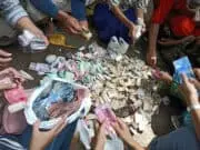 Uang Puluhan Juta Rupiah Ditemukan di Tumpukan Sampah Uang Puluhan Juta Rupiah Ditemukan di Tumpukan Sampah