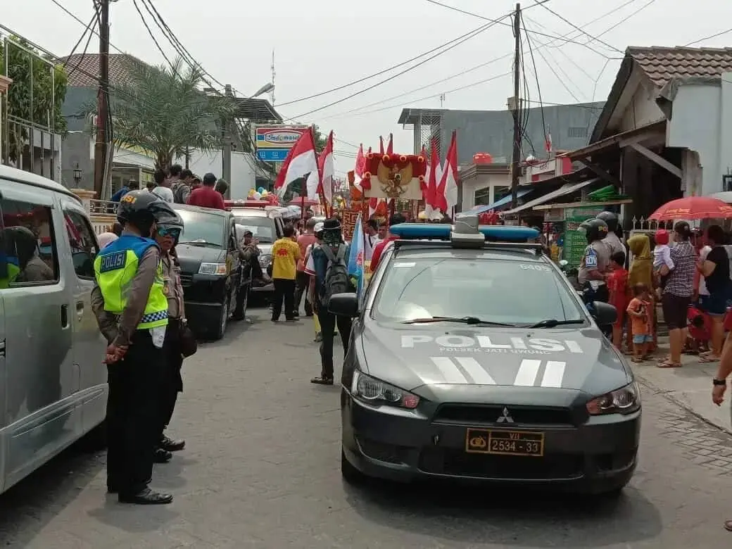 Kapolsek Jatiuwung Berikan Pengamanan Kirab Ritual Kebudayaan