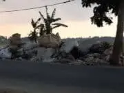 Warga Keluhkan Tumpukan Limbah Di Irigasi