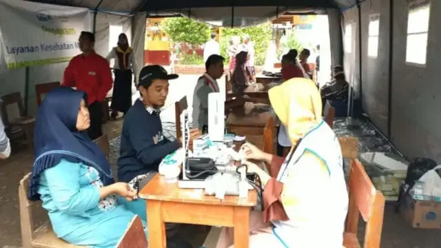 Pasca Banjir, Warga Mauk Mendapatkan Pengobatan Gratis Pasca Banjir, Warga Mauk Mendapatkan Pengobatan Gratis