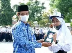 Hasna, Siswi SMPN 1 Purworejo Berhasil Meraih Juara 2 Asian Music Games 2021 Hasna, Siswi SMPN 1 Purworejo Berhasil Meraih Juara 2 Asian Music Games 2021