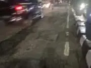 Sehari Sebelum Presiden Jokowi Tiba di Jambi, Jalan Berlubang Diperbaiki Tampak kondisi Jalan Gatot Subroto, Kota Jambi yang dilakukan perbaikan sehari sebelum Presiden Jokowi tiba di Jambi.