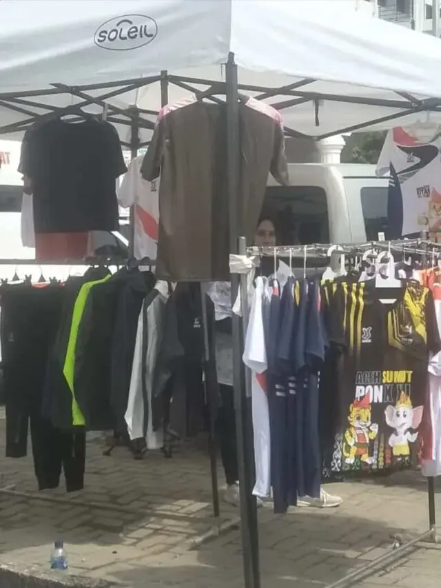 Kaos Berlogo PON XXI Laris Manis di Medan Kaos Berlogo PON XXI Laris Manis di Medan