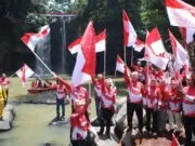 Pengibaran Bendera Merah Putih di Asahan Sambut HUT ke-80 RI serta Promosi Lokasi Wisata